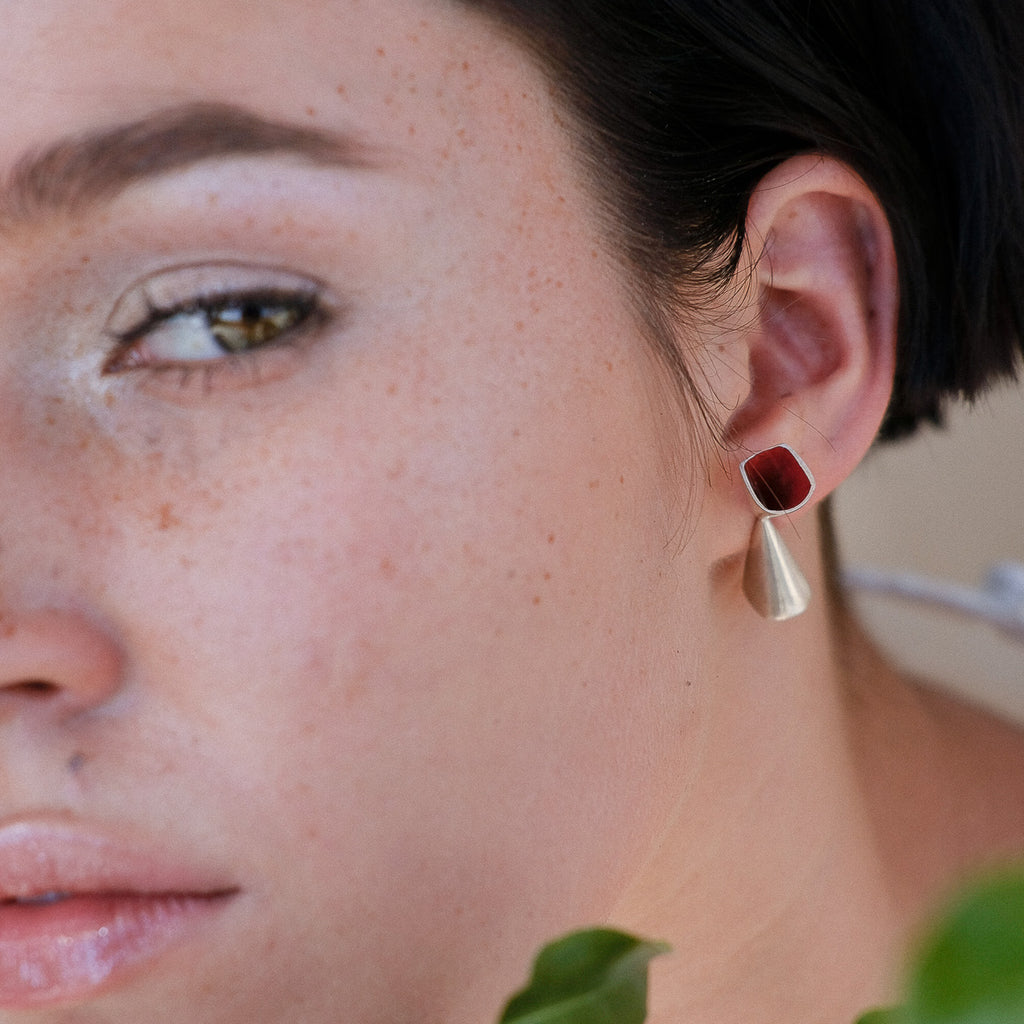 Model wearing Anja Berg - Silver and Red Enamel Chalice Designer Earrings on IndieFaves