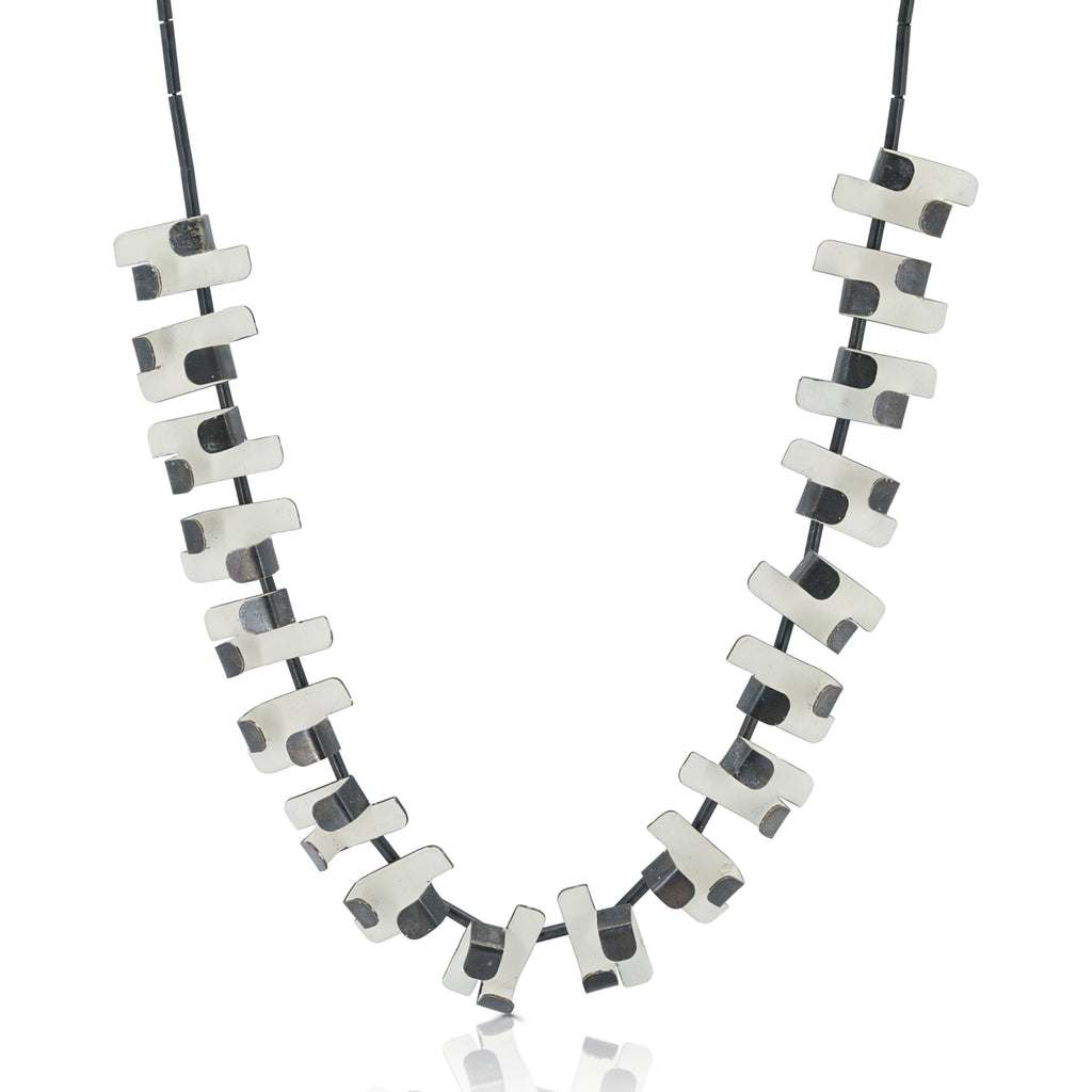 Gemma Canal - Plegs Designer Necklace Shape 5 White on IndieFaves