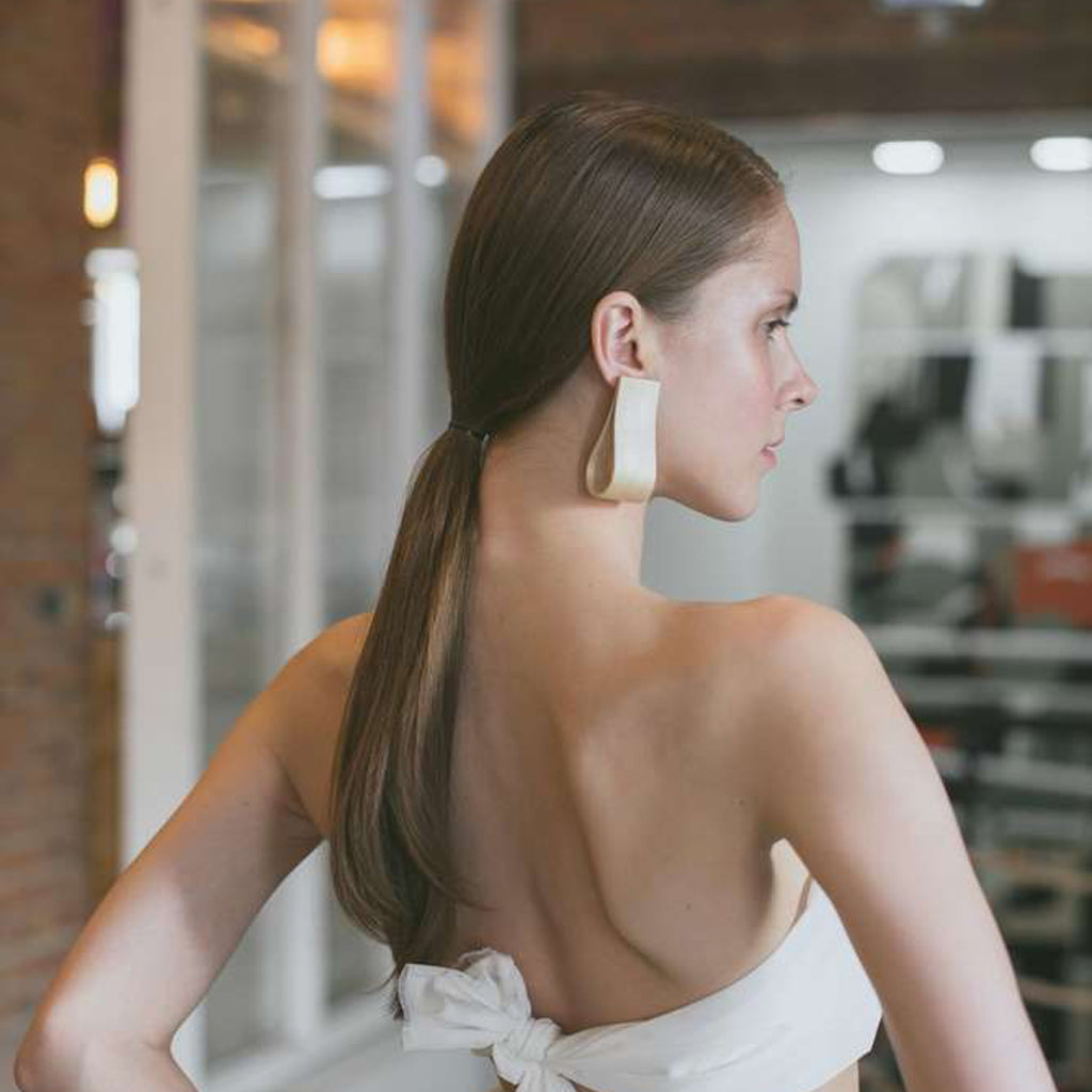 Model wearing Sustainable BirchWood Wooden Bent Designer Earrings on IndieFaves