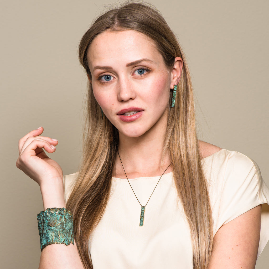 Model wearing Elena Perez - Wide Moss Designer Earrings on IndieFaves
