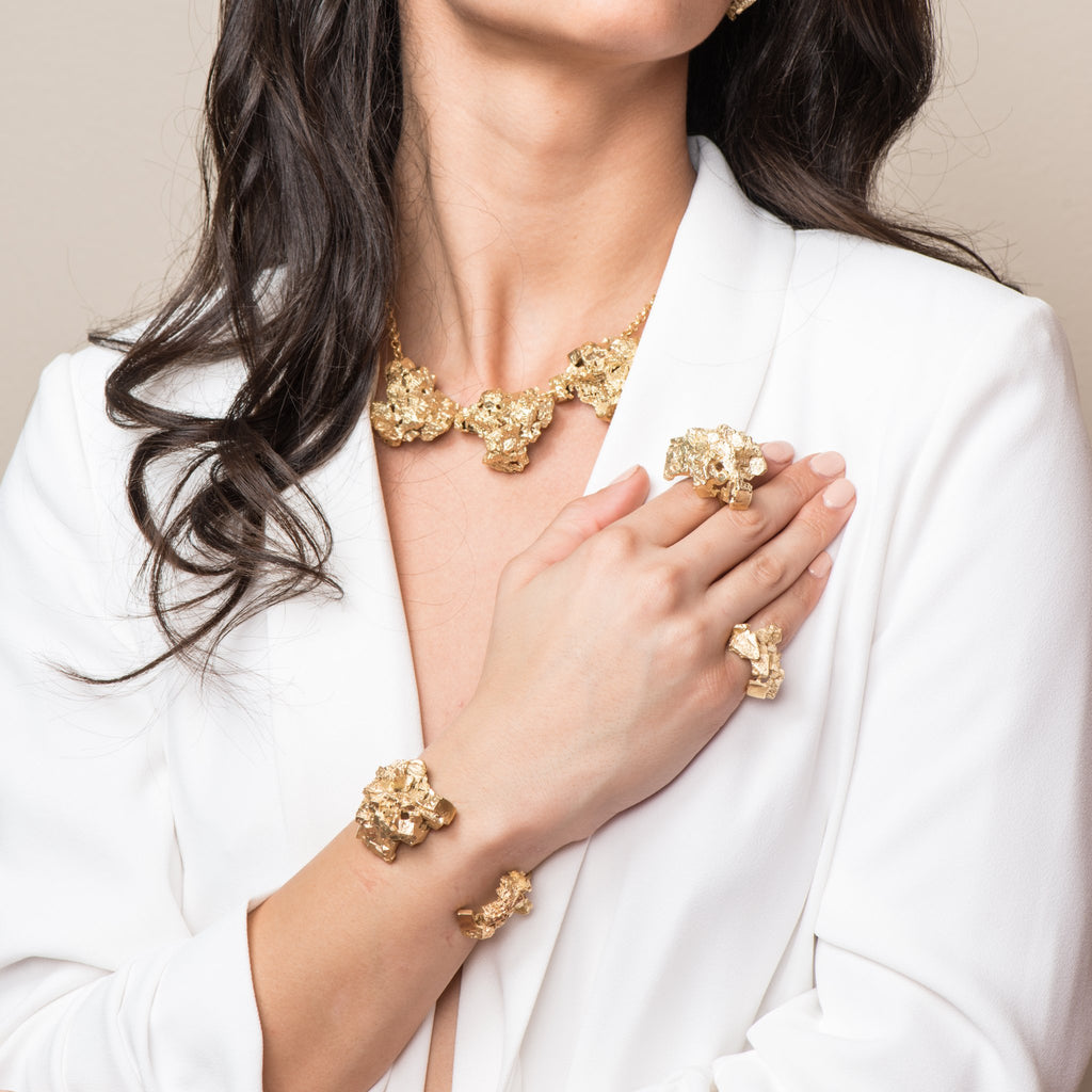 Model wearing 18K Gold-Plated Brass Fluorita Big Designer Bracelet on IndieFaves