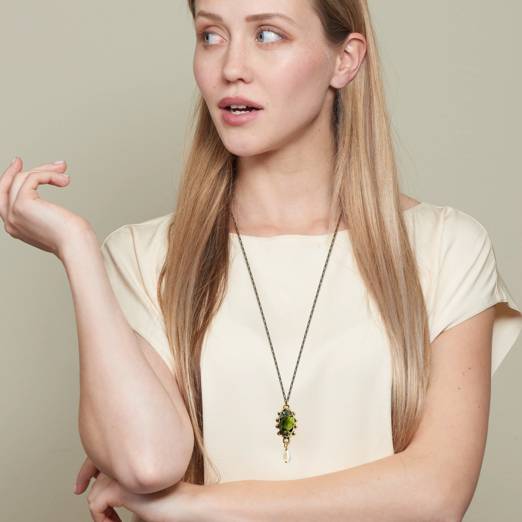 Model wearing Pauletta Brooks - Green Tourmaline Designer Pendant With Pearl on IndieFaves