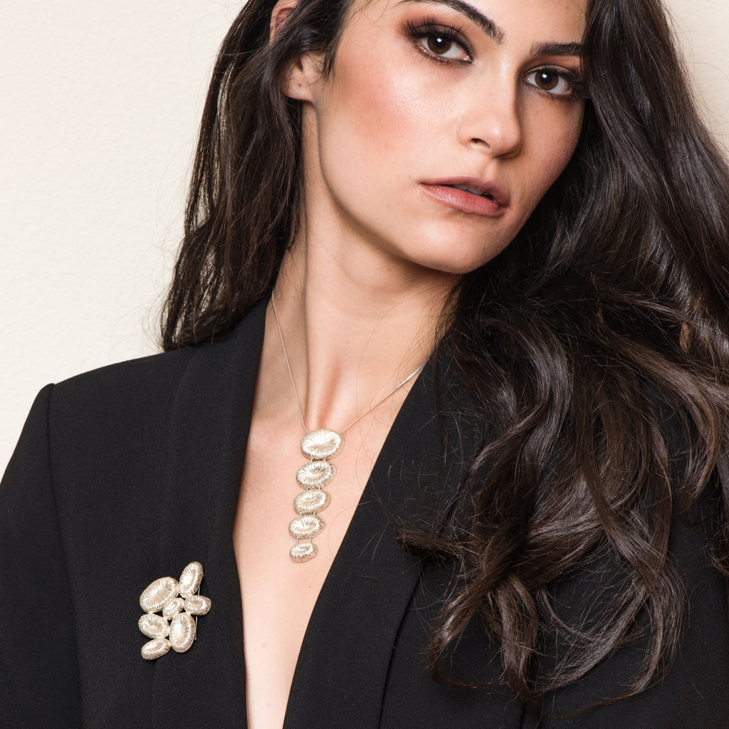 Model wearing 18K Gold-Plated Silver Stairs Designer Necklace on IndieFaves