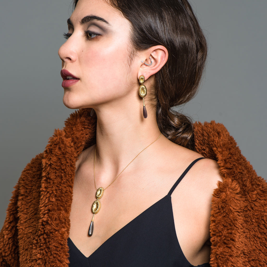 Model wearing the 18K Gold-Plated Silver and Green Opal Drop Designer Earrings on IndieFaves