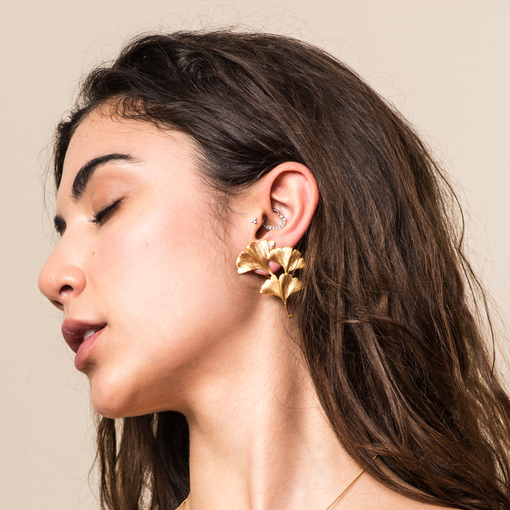 Model wearing Gingko Designer Earrings on IndieFaves
