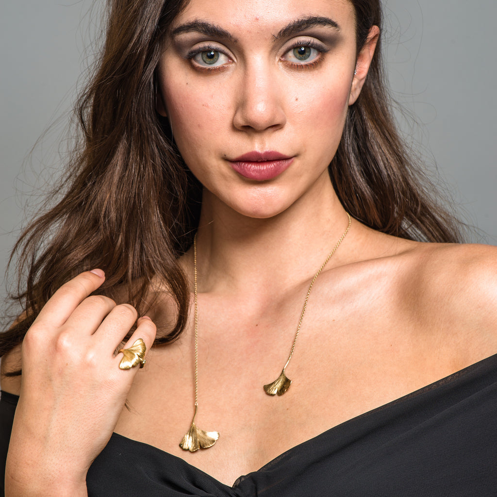 Model wearing Mara Soriano - Gingko Designer Necklace with Green Sapphire on IndieFaves